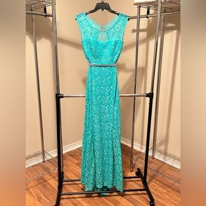 Teal lace dress with satin rhinestone belt.